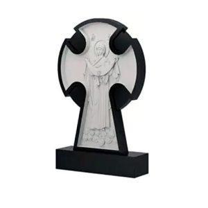 Памятник барельеф С крестом и святым