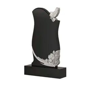 Памятник барельеф с птицей и розами